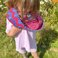 SAMPLE SALE: 26AR: Kaffe Fassett Collective Infinity Scarf with Blue Pompom Trim (Red/Blue/Purple)